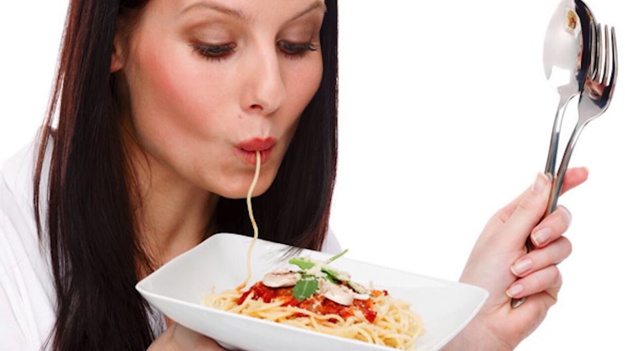 woman eats spaghetti to slim stomach